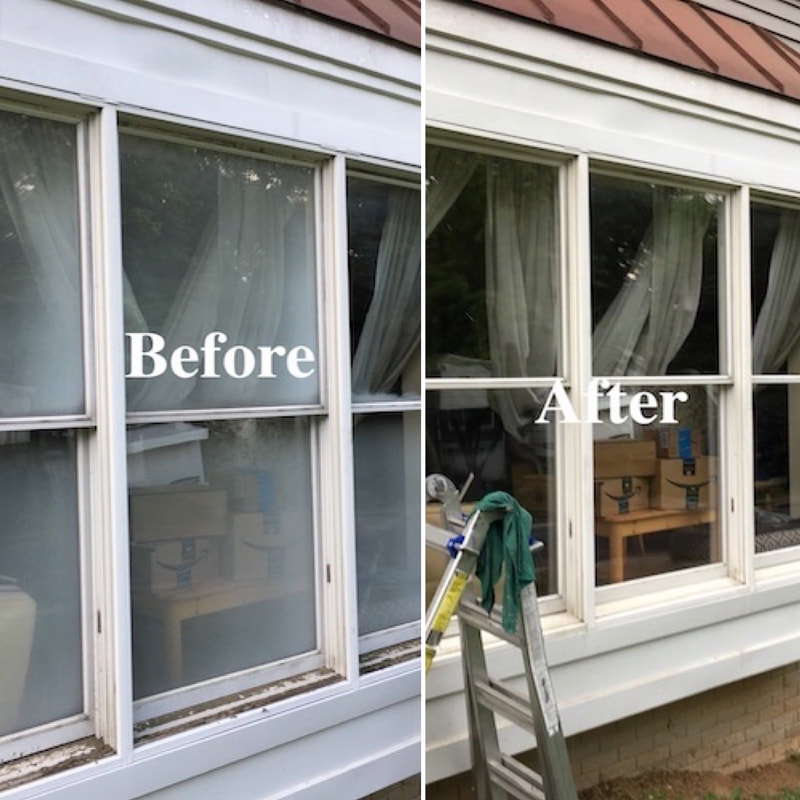 Bear Window Washing technician cleaning residential windows